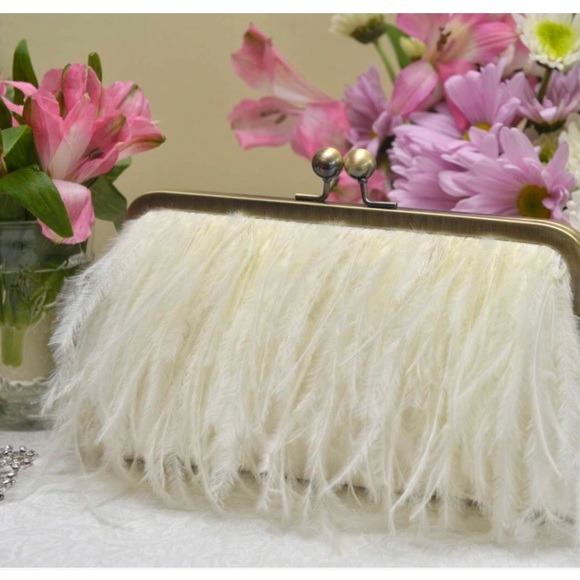 white feather clutch bag
